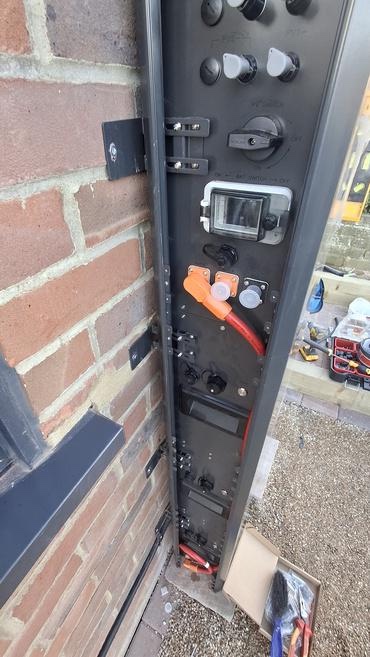 Side view of the installation showing the DC isolators, connectors and contained cable runs